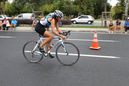 ISTANBUL, TURKEY - AUGUST 21, 2016: Athletes competing in cycling component of Istanbul Triathlon in Marmara Sea coast. 586 triathletes attempt to sixth Istanbul Thriathlon.のeditorial素材