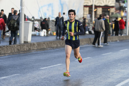 ISTANBUL, TURKEY - NOVEMBER 13, 2016: Athlete running in 38. Istanbul marathon which includes two continents in one race. Marathon starts on the Asian side and finishs in European side of Istanbul.のeditorial素材