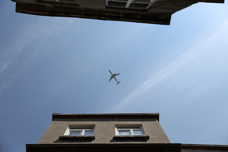 A plane goes over Istanbul city, Turkeyの写真素材