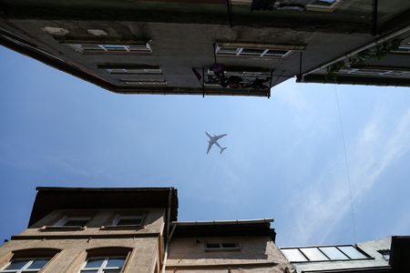 A plane goes over Istanbul city, Turkeyの写真素材