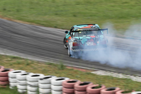 KOCAELI, TURKEY - MAY 14, 2017: Drift car performs show during Turkish Touring Car Championships.