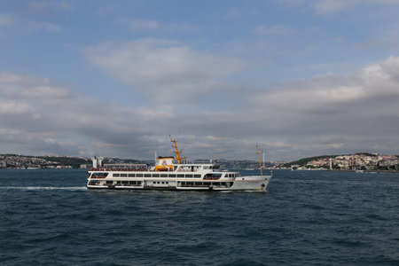 ISTANBUL, TURKEY - MAY 27, 2017: Sehir Hatlari ferry in Bosphorus Strait. Sehir Hatlari was established in 1844 and now carry 150,000 passengers a day.のeditorial素材