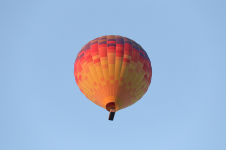 Hot Air Balloon Over Goreme Town, Turkeyの写真素材