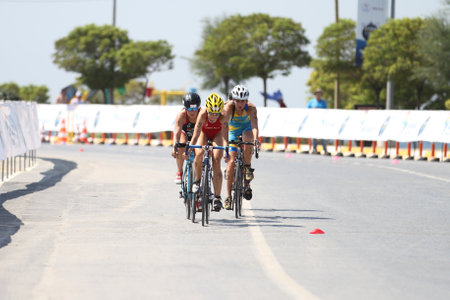 ISTANBUL, TURKEY - JULY 30, 2017: Athletes competing in cycling component of Istanbul Beylikduzu ETU Triathlon European Cup.のeditorial素材