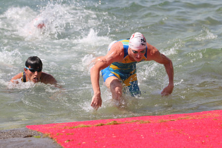 ISTANBUL, TURKEY - JULY 30, 2017: Athletes competing in swimming component of Istanbul Beylikduzu ETU Triathlon European Cup.のeditorial素材