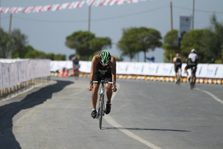 ISTANBUL, TURKEY - JULY 29, 2017: Athlete competing in cycling component of Istanbul Beylikduzu ETU Triathlon European Cup.のeditorial素材