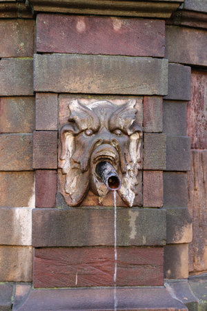 Statue over Well in Stortorget Place, Stockholm City, Swedenのeditorial素材