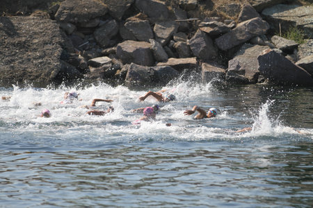 ISTANBUL, TURKEY - AUGUST 13, 2017: Athletes competing in swimming component of Istanbul Kartal Triathlon.のeditorial素材