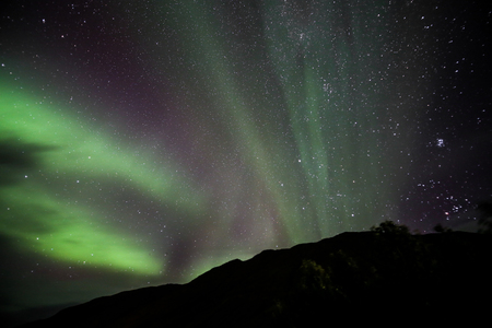 Northern Lights Shown over Akureyri Town, Icelandの写真素材