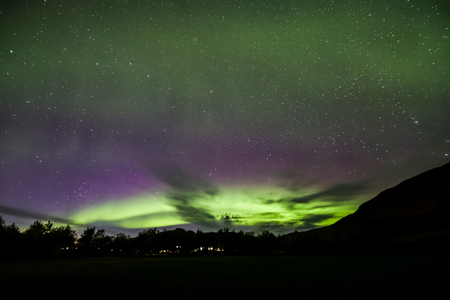 Northern Lights Shown over Akureyri Town, Icelandの写真素材