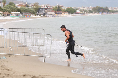 ANTALYA, TURKEY - SEPTEMBER 30, 2017: Athlete competing in swimming component of Alanya Triathlon.のeditorial素材