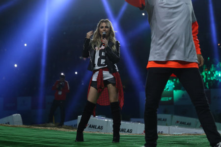 ISTANBUL, TURKEY - NOVEMBER 25, 2017: Turkish singer Merve Ozbey concert during Istanbul Superenduro championship in Atakoy Athletics Arena.のeditorial素材