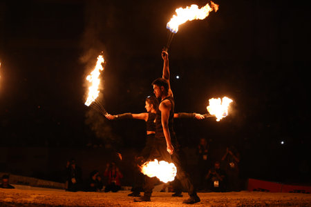 ISTANBUL, TURKEY - NOVEMBER 25, 2017: Fire dancers perform during Istanbul Superenduro championship in Atakoy Athletics Arena.のeditorial素材