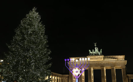 Menorah and Christmas Tree in front of Brandenburg Gate, Pariser Platz, Berlin, Germanyのeditorial素材