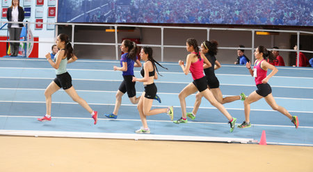 ISTANBUL, TURKEY - JANUARY 27, 2018: Athletes running during Turkcell Turkish U20 Indoor Athletics Championshipsのeditorial素材