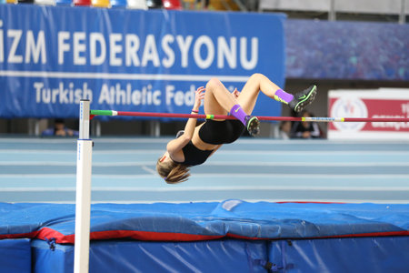 ISTANBUL, TURKEY - JANUARY 28, 2018: Undefined athlete high jumping during Turkcell Turkish U20 Indoor Athletics Championshipsのeditorial素材