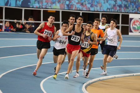 ISTANBUL, TURKEY - JANUARY 28, 2018: Athletes running during Turkcell Turkish U20 Indoor Athletics Championshipsのeditorial素材
