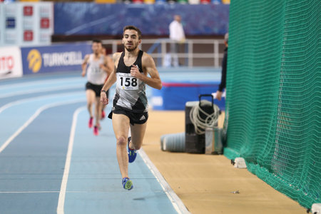 ISTANBUL, TURKEY - JANUARY 07, 2018: Athletes running during Turkish Athletic Federation Threshold Indoor Competitionsのeditorial素材