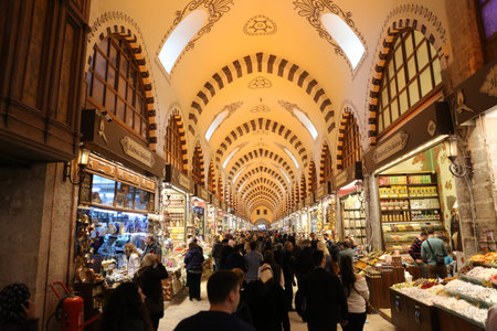 ISTANBUL, TURKEY - MARCH 17, 2018: People shopping at Spice Bazaar. The Spice Bazaar is one of the...