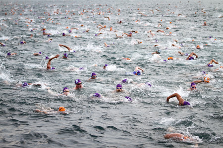 ISTANBUL, TURKEY - JULY 22, 2018: Swimmers swim during Samsung Bosphorus Cross Continental Swimming Competition in Bosphorus Strait.のeditorial素材
