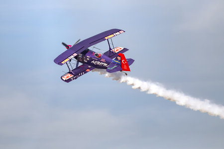 ISTANBUL, TURKEY - SEPTEMBER 23, 2018: Turkish aerobatic pilot Ali Ismet Ozturk performs air...