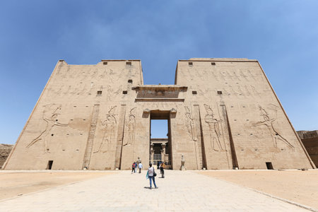 EDFU, EGYPT - MARCH 27, 2019: People in front of Edfu temple