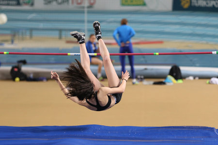 ISTANBUL, TURKEY - FEBRUARY 29, 2020: Undefined athlete high jumping during â€‹Ruhi Sarialp...