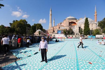 ISTANBUL, TURKEY - AUGUST 01, 2020: People visit and pray Hagia Sophia after its conversion to mosqueのeditorial素材