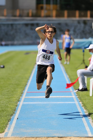ISTANBUL, TURKEY - AUGUST 07, 2020: Undefined athlete triple jumping during Turkish Athletic...