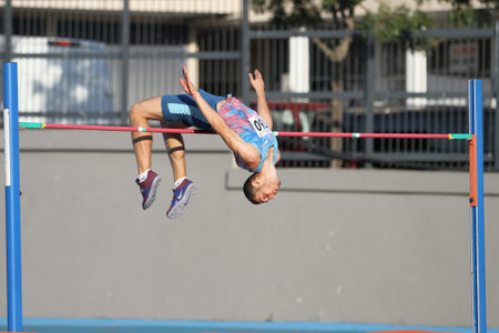 ISTANBUL, TURKEY - AUGUST 06, 2020: Undefined athlete high jumping during Turkish Athletic...