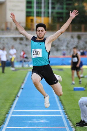 ISTANBUL, TURKEY - AUGUST 06, 2020: Undefined athlete triple jumping during Turkish Athletic...