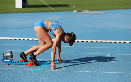ISTANBUL, TURKEY - SEPTEMBER 12, 2020: Undefined athlete running 400 metres hurdles during Balkan U20 Athletics Championshipsのeditorial素材
