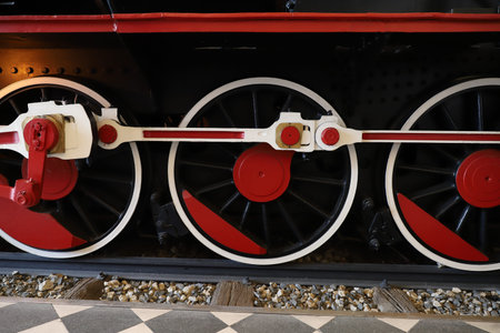 Red and White Wheels of Steam Engine Locomotive