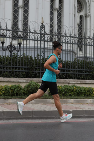ISTANBUL, TURKEY - SEPTEMBER 20, 2020: Athlete running Istanbul Half Marathon in old town of...