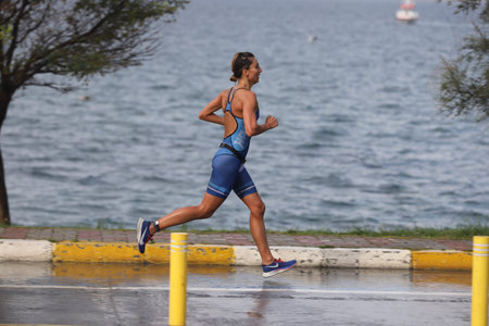 ISTANBUL, TURKEY - OCTOBER 18, 2020:  Undefined athlete competing in running component of Istanbul...