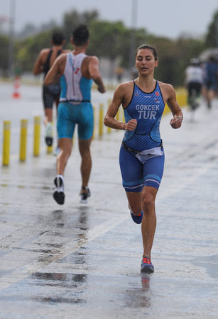 ISTANBUL, TURKEY - OCTOBER 18, 2020:  Undefined athlete competing in running component of Istanbul Sprint Triathlonのeditorial素材