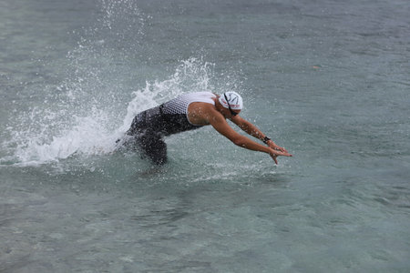 ISTANBUL, TURKEY - OCTOBER 18, 2020:  Undefined athlete competing in swimming component of Istanbul Sprint Aquathlonのeditorial素材