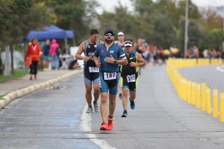 ISTANBUL, TURKEY - OCTOBER 18, 2020:  Athletes competing in running component of Istanbul Sprint Triathlonのeditorial素材