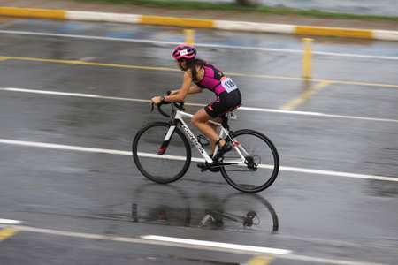 ISTANBUL, TURKEY - OCTOBER 18, 2020:  Undefined athlete competing in cycling component of Istanbul Sprint Triathlonのeditorial素材