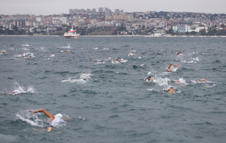 ISTANBUL, TURKEY - OCTOBER 18, 2020:  Athletes competing in swimming component of Istanbul Sprint Triathlonのeditorial素材