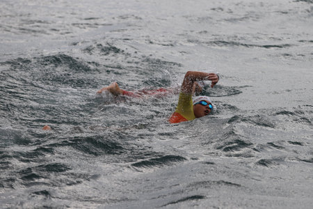 ISTANBUL, TURKEY - OCTOBER 18, 2020:  Athletes competing in swimming component of Istanbul Sprint Aquathlonのeditorial素材