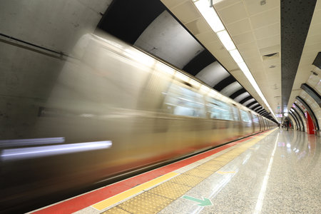 Motin Blured Metro Moving in a Stationのeditorial素材
