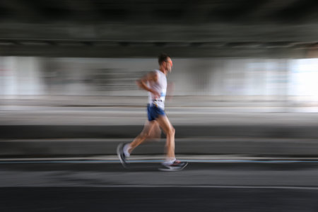 ISTANBUL, TURKEY - NOVEMBER 08, 2020: Undefined athlete running in 42. Istanbul marathon which includes two continents in one race.のeditorial素材