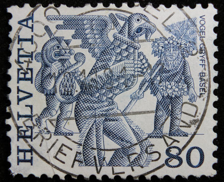 ISTANBUL, TURKEY - DECEMBER 26, 2020: Switzerland stamp shows Griffins, Basel circa 1977のeditorial素材