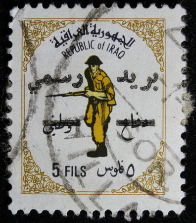 ISTANBUL, TURKEY - DECEMBER 26, 2020: Iraq stamp shows soldierのeditorial素材