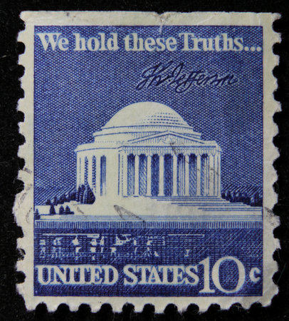 ISTANBUL, TURKEY - DECEMBER 26, 2020: USA stamp shows Jefferson Memorial and Signature circa 1973のeditorial素材