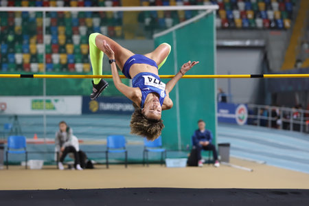 ISTANBUL, TURKEY - FEBRUARY 07, 2021: Undefined athlete high jumping during Turkish Indoor Athletics Championshipsのeditorial素材