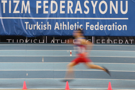ISTANBUL, TURKEY - FEBRUARY 20, 2021: Undefined athlete running during Balkan Athletics Indoor...