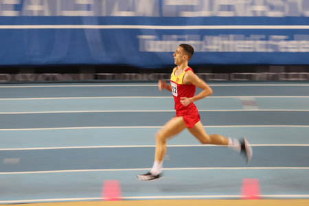 ISTANBUL, TURKEY - FEBRUARY 20, 2021: Undefined athlete running during Balkan Athletics Indoor Championshipsのeditorial素材