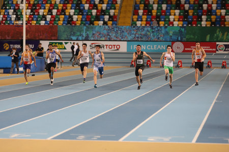 ISTANBUL, TURKEY - JANUARY 30, 2021: Athletes running 60 metres during Turkish Athletic Federation Olympic Threshold Competitionsのeditorial素材